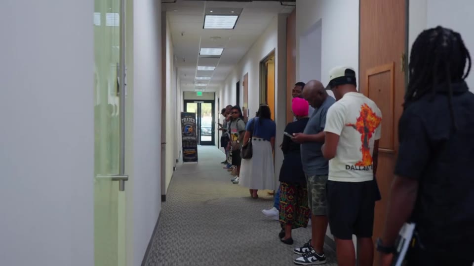 Members lining up for an in-person session in Dallas
